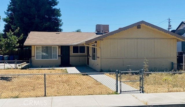 113 Alameda Ave, Chowchilla, CA 93610 - view of front of property featuring a gate