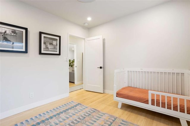 5923 Abernathy Dr, Los Angeles, CA 90045 - bedroom featuring wood finished floors and recessed lighting