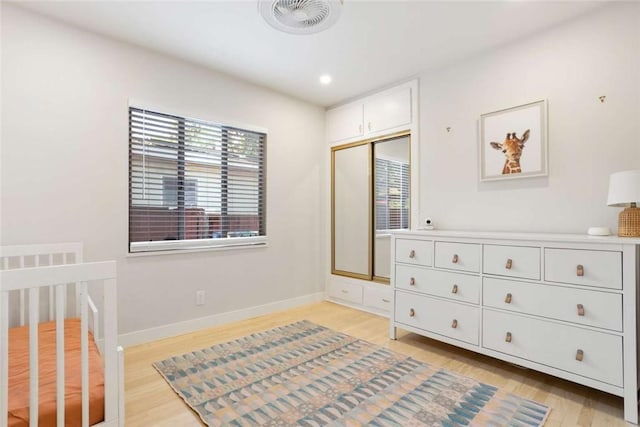 5923 Abernathy Dr, Los Angeles, CA 90045 - bedroom featuring light wood-style flooring and recessed lighting