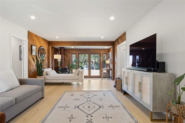 5923 Abernathy Dr, Los Angeles, CA 90045 - living area featuring wood walls, light wood-style flooring, and recessed lighting
