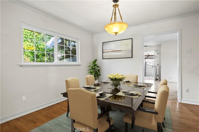 13232 Lorca Rd, La Mirada, CA 90638 - dining space featuring wood finished floors and ornamental molding