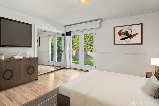13232 Lorca Rd, La Mirada, CA 90638 - bedroom with access to outside, light wood finished floors, ornamental molding, and french doors