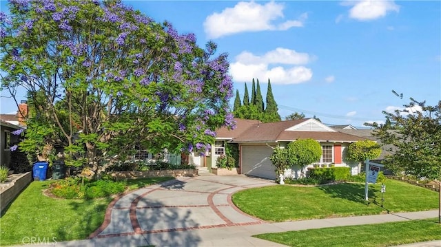 13232 Lorca Rd, La Mirada, CA 90638 - view of front of home with an attached garage, a front lawn, and driveway