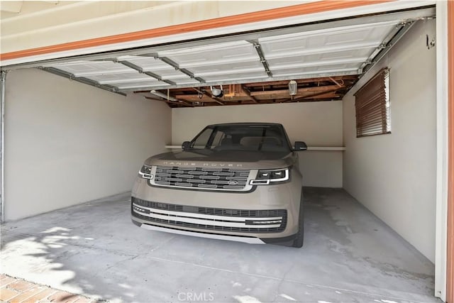 13232 Lorca Rd, La Mirada, CA 90638 - garage featuring a garage door opener