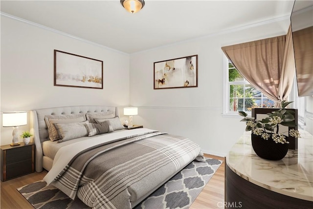 13232 Lorca Rd, La Mirada, CA 90638 - bedroom featuring light wood-type flooring and crown molding