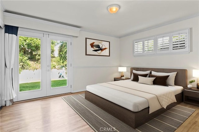 13232 Lorca Rd, La Mirada, CA 90638 - bedroom with access to outside, ornamental molding, and wood finished floors