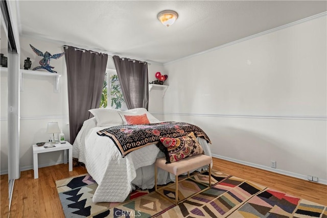 13232 Lorca Rd, La Mirada, CA 90638 - bedroom featuring wood finished floors and ornamental molding