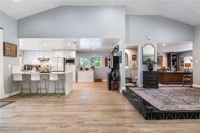 95 Buckskin Rd, Bell Canyon, CA 91307 - foyer with light wood-type flooring, high vaulted ceiling, and arched walkways