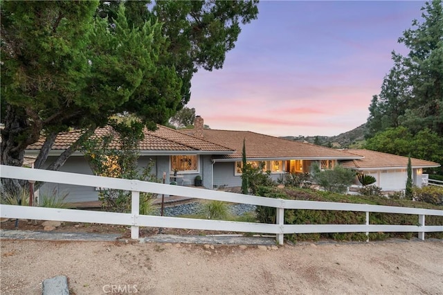 95 Buckskin Rd, Bell Canyon, CA 91307 - view of front of property with a fenced front yard, a chimney, and a tiled roof