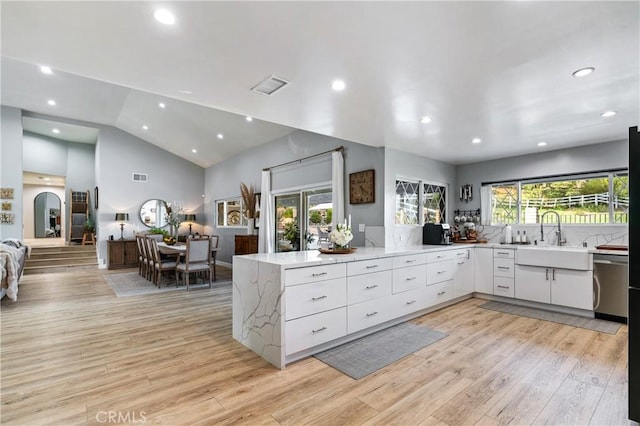 95 Buckskin Rd, Bell Canyon, CA 91307 - kitchen featuring stainless steel dishwasher, recessed lighting, white cabinetry, light wood-type flooring, and a peninsula
