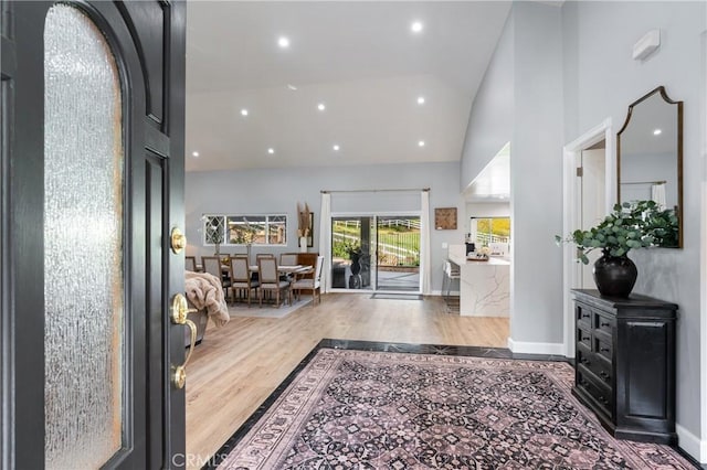 95 Buckskin Rd, Bell Canyon, CA 91307 - entryway with high vaulted ceiling, wood finished floors, and recessed lighting