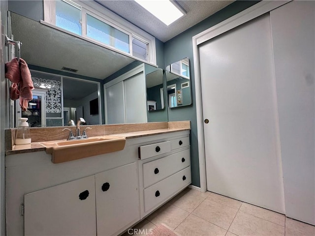 22709 Elm Ave, Torrance, CA 90505 - bathroom with tile patterned flooring and vanity