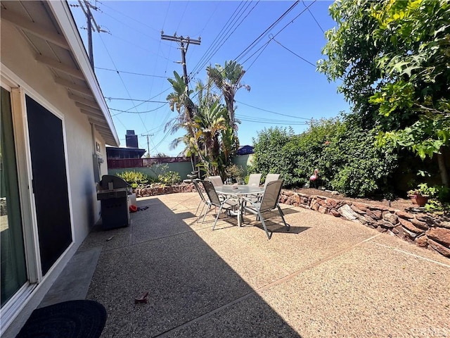 22709 Elm Ave, Torrance, CA 90505 - fenced backyard featuring outdoor dining area, grilling area, and a patio