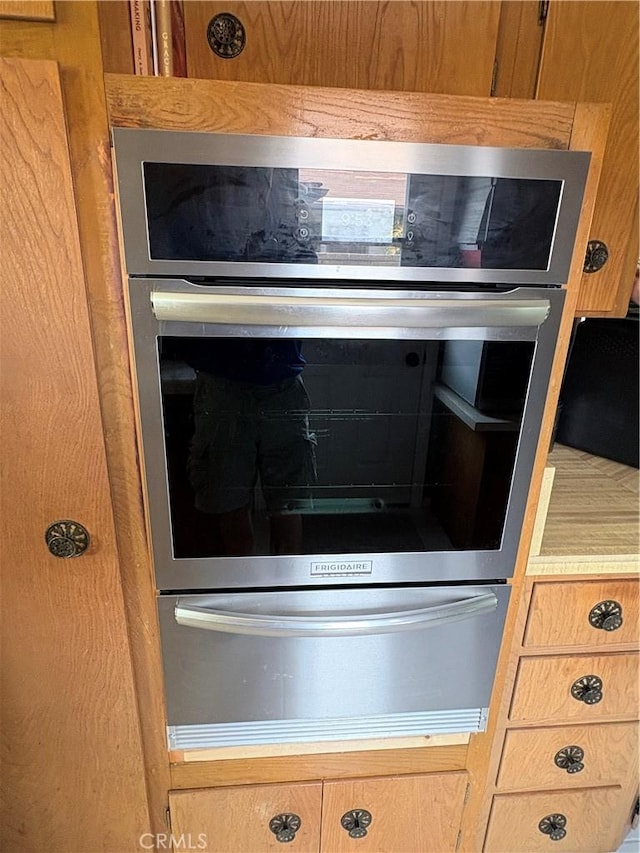 22709 Elm Ave, Torrance, CA 90505 - kitchen view of light countertops, stainless steel oven, and a warming drawer