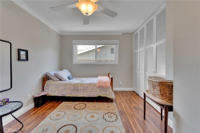 1428 N Erin Ave, Upland, CA 91786 - bedroom with wood finished floors, crown molding, ceiling fan, and a closet