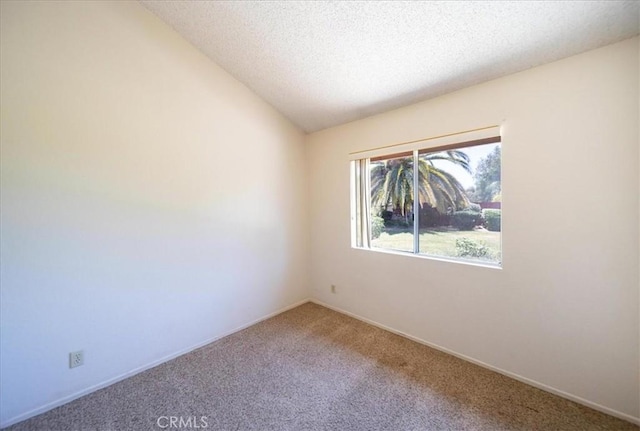 42205 Rubicon Cir, Temecula, CA 92591 - carpeted empty room with a textured ceiling and lofted ceiling