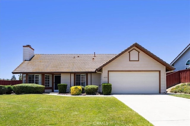 42205 Rubicon Cir, Temecula, CA 92591 - view of front of property featuring a chimney, an attached garage, concrete driveway, and a tiled roof