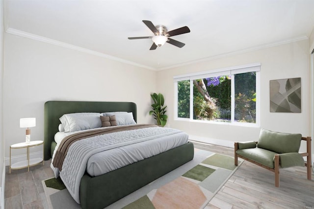 2535 Jefferson St Unit 10, Carlsbad, CA 92008 - bedroom with ornamental molding, wood finished floors, and a ceiling fan