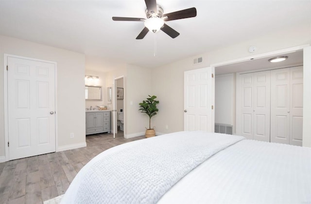 2535 Jefferson St Unit 10, Carlsbad, CA 92008 - bedroom featuring light wood-type flooring, ceiling fan, a closet, and ensuite bath