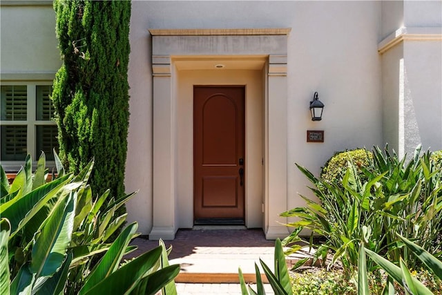 320 Bronze, Irvine, CA 92618 - view of exterior entry featuring stucco siding
