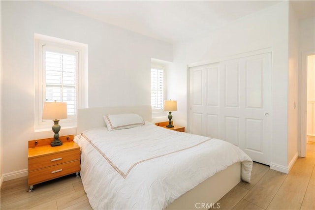 320 Bronze, Irvine, CA 92618 - bedroom featuring light wood-style floors and a closet