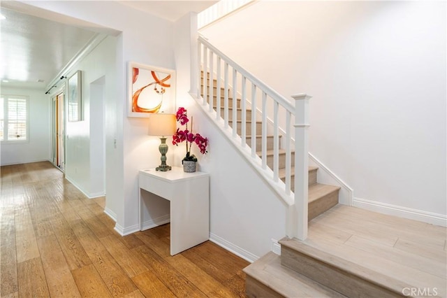 320 Bronze, Irvine, CA 92618 - staircase featuring hardwood / wood-style flooring and baseboards