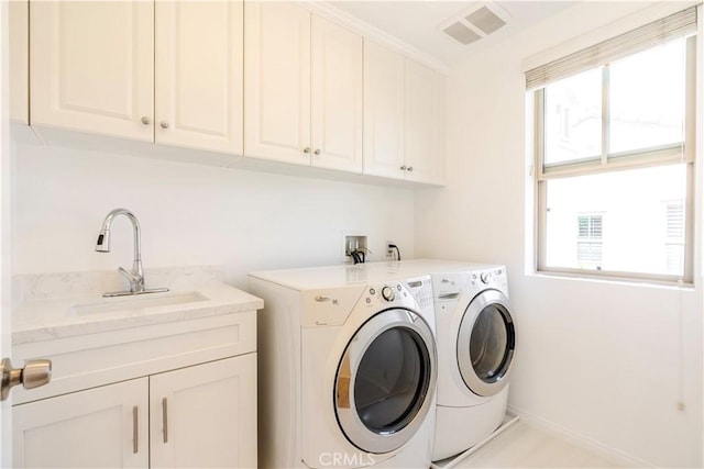 320 Bronze, Irvine, CA 92618 - laundry area with cabinet space and washing machine and clothes dryer