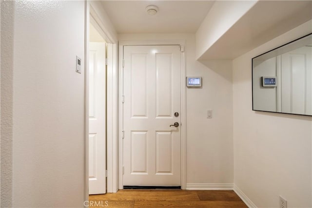 320 Bronze, Irvine, CA 92618 - doorway to outside featuring wood finished floors and baseboards