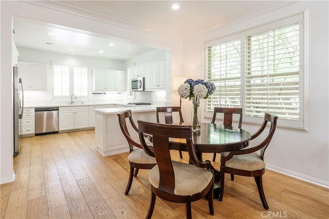 320 Bronze, Irvine, CA 92618 - dining space featuring light wood finished floors and recessed lighting