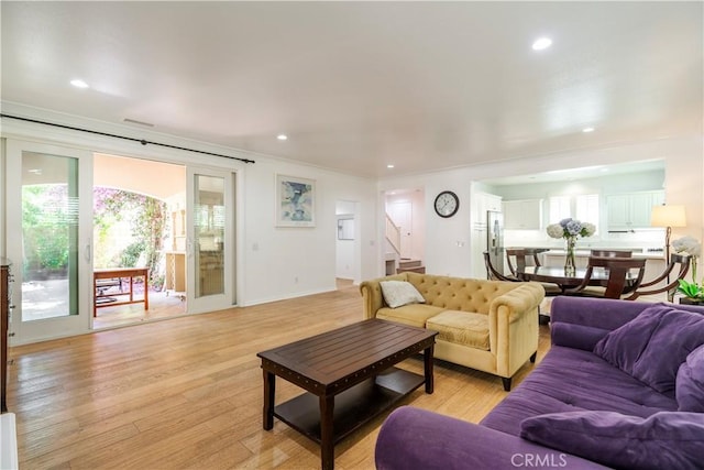 320 Bronze, Irvine, CA 92618 - living room with stairs, crown molding, recessed lighting, and light wood finished floors