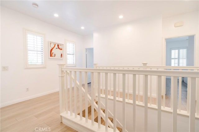 320 Bronze, Irvine, CA 92618 - corridor with an upstairs landing, light wood-style floors, and recessed lighting