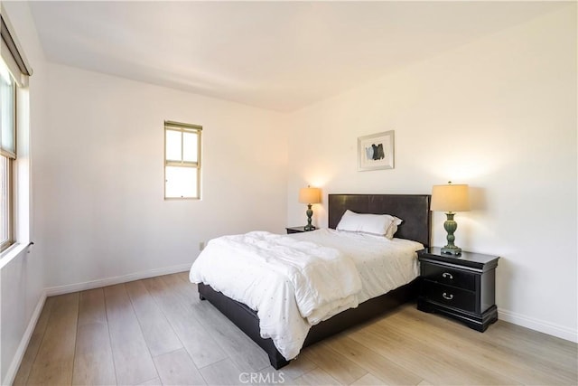 320 Bronze, Irvine, CA 92618 - bedroom featuring light wood-type flooring and baseboards