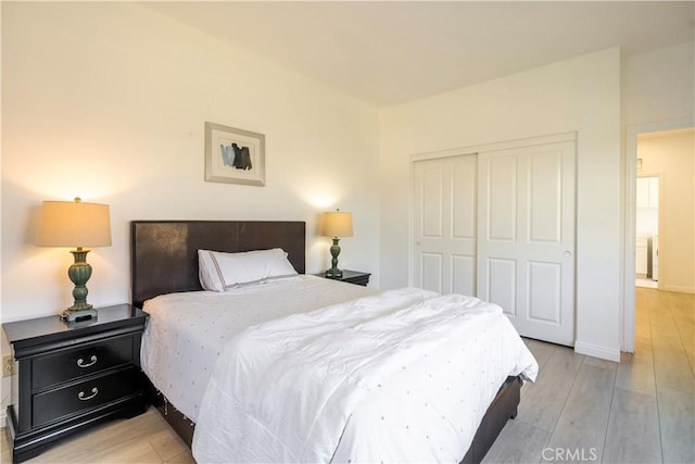 320 Bronze, Irvine, CA 92618 - bedroom featuring light wood-type flooring and a closet