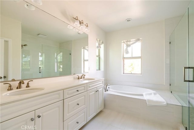 320 Bronze, Irvine, CA 92618 - bathroom featuring a garden tub, double vanity, and a shower stall