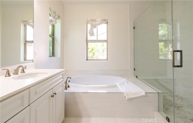 320 Bronze, Irvine, CA 92618 - bathroom with vanity, a garden tub, and a shower stall