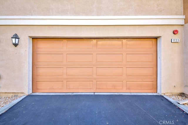1133 Maag Pl Unit 107, Fullerton, CA 92833 - garage with driveway