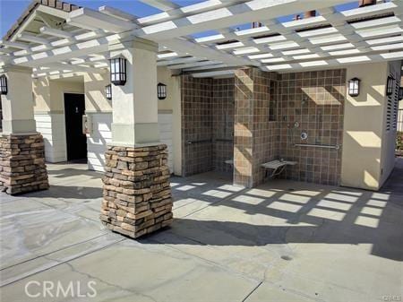 1133 Maag Pl Unit 107, Fullerton, CA 92833 - view of patio / terrace featuring a pergola