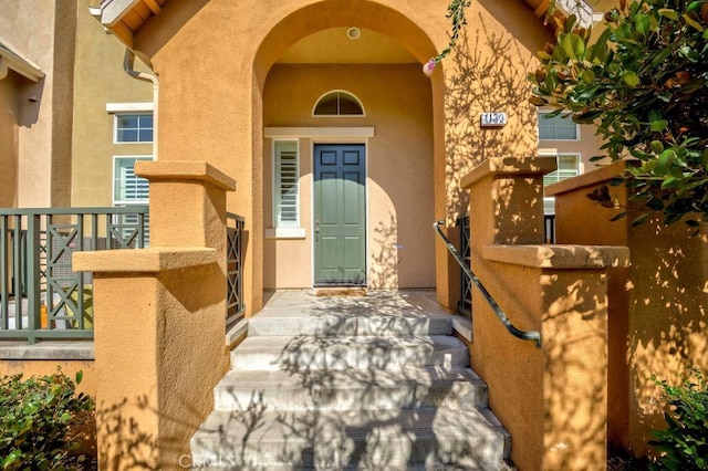 1133 Maag Pl Unit 107, Fullerton, CA 92833 - doorway to property featuring stucco siding