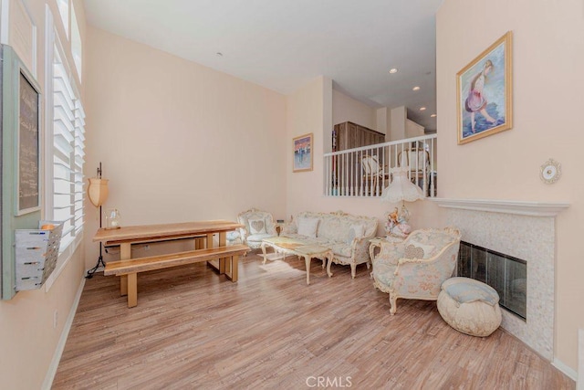 1133 Maag Pl Unit 107, Fullerton, CA 92833 - living room featuring wood finished floors, a fireplace, and recessed lighting