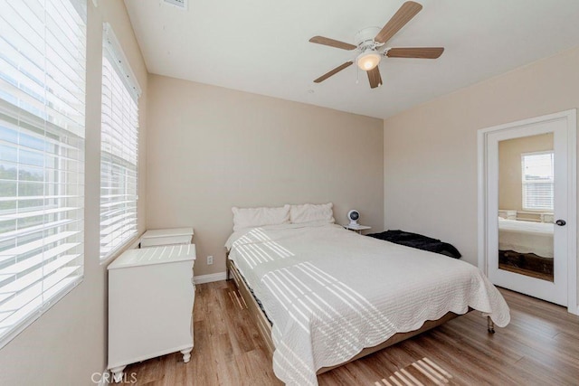 1133 Maag Pl Unit 107, Fullerton, CA 92833 - bedroom with light wood finished floors and ceiling fan