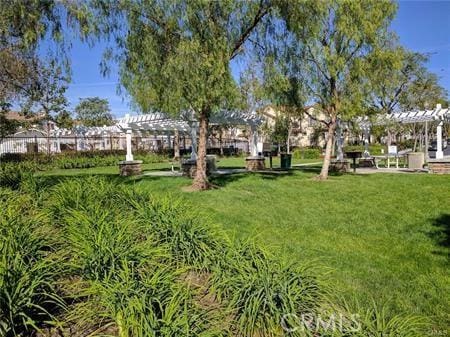 1133 Maag Pl Unit 107, Fullerton, CA 92833 - view of green lawn with a pergola