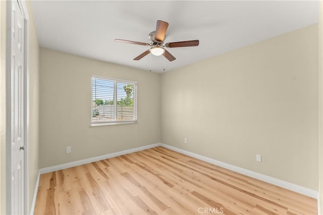 1446 Morgan Rd, San Bernardino, CA 92407 - spare room with wood finished floors and a ceiling fan