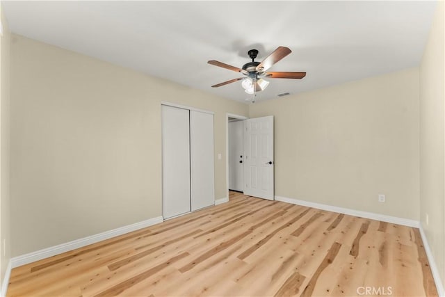 1446 Morgan Rd, San Bernardino, CA 92407 - unfurnished bedroom featuring wood finished floors, a closet, and ceiling fan