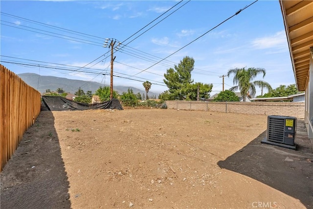 1446 Morgan Rd, San Bernardino, CA 92407 - fenced backyard featuring a mountain view