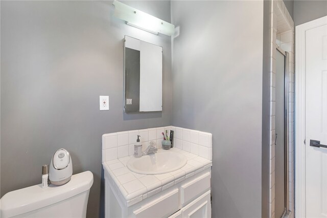 942 University Ave, Burbank, CA 91504 - full bathroom featuring a shower stall, vanity, and decorative backsplash