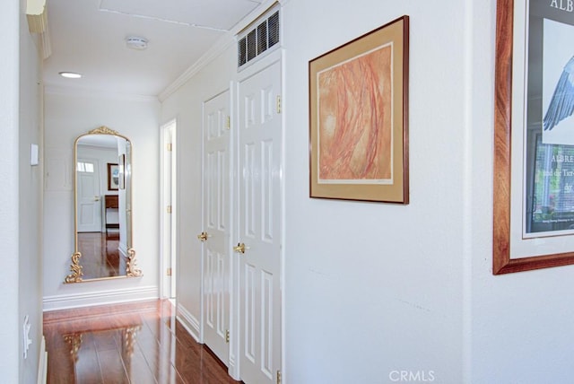 3179 Alta Vis Unit A, Laguna Woods, CA 92637 - hall featuring wood finished floors, crown molding, and arched walkways