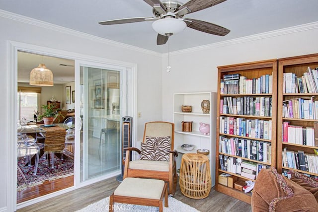 3179 Alta Vis Unit A, Laguna Woods, CA 92637 - living area with wood finished floors, a ceiling fan, and ornamental molding