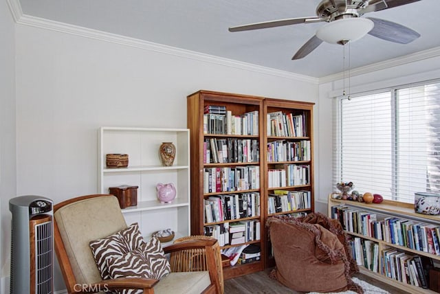3179 Alta Vis Unit A, Laguna Woods, CA 92637 - sitting room featuring ceiling fan, wood finished floors, and ornamental molding