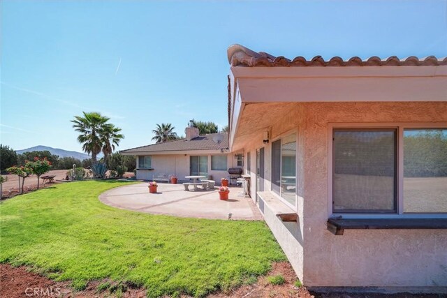 6020 Valley Sage Rd, Acton, CA 93510 - view of green lawn with a patio and a mountain view