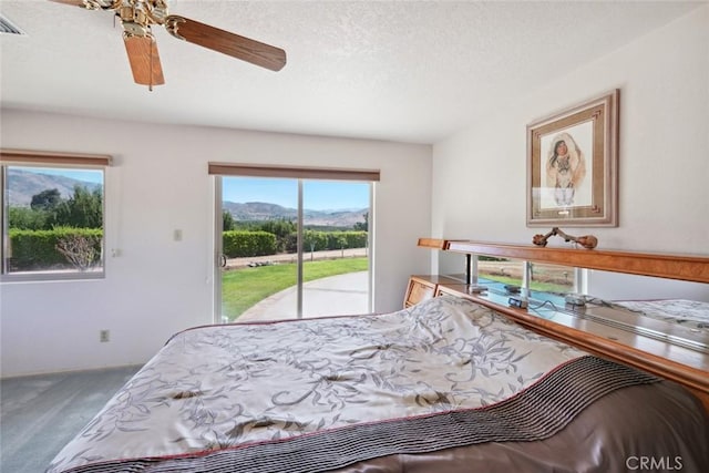 6020 Valley Sage Rd, Acton, CA 93510 - bedroom with access to outside, carpet flooring, and a ceiling fan